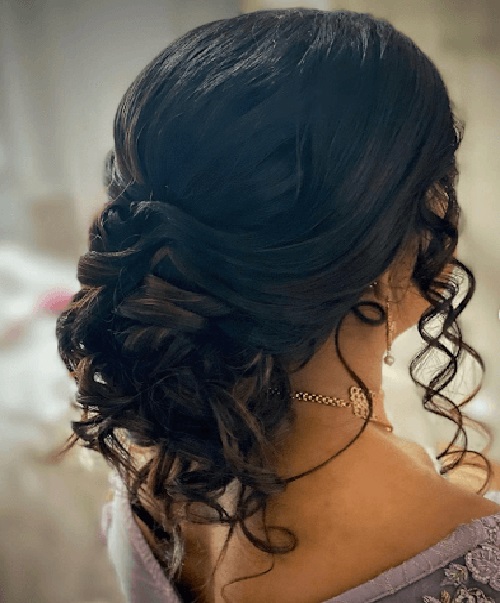 Loose Curl Messy Bun Hairstyle