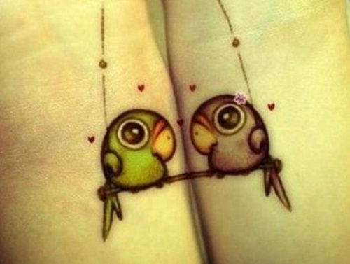 Matching Parrot Wrist Tattoos