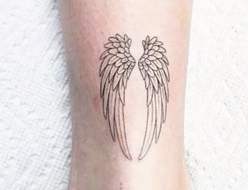 Paired Angel Wings On Leg