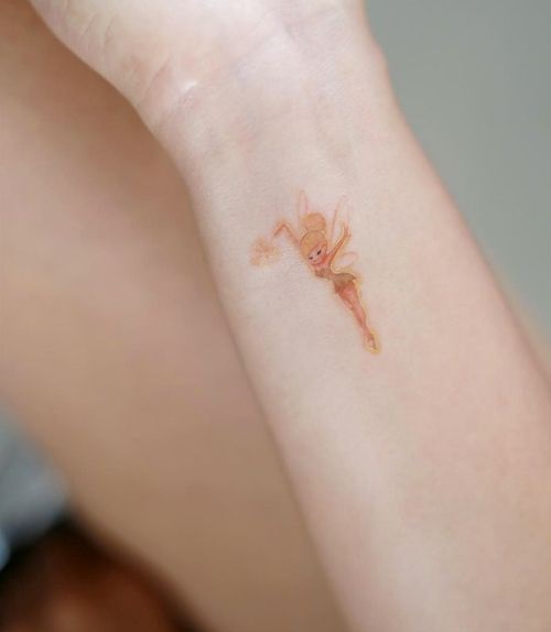Simple Fairy Wrist Design Tattoo