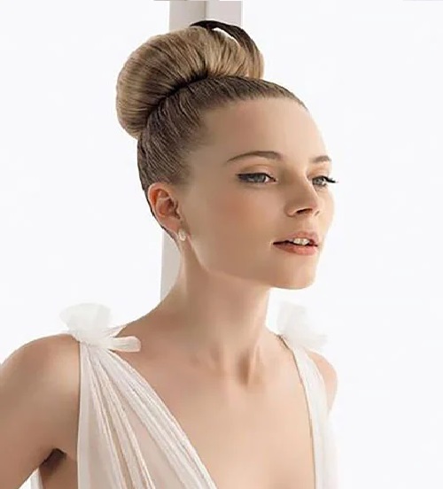 Sleek And Neat Top Updo Hairstyle For Brides