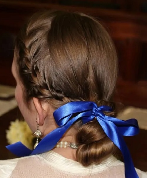 Sleek Low Side Braided Bun With Ribbon