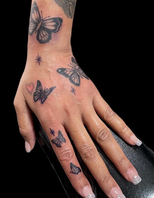 Small butterfly bunch tattoo