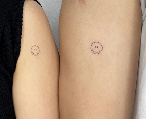 Smiley Matching Couple Tattoos