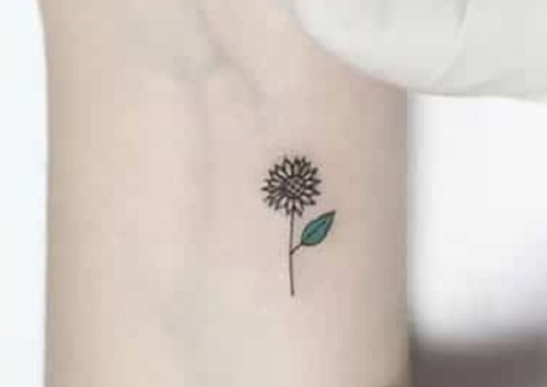 Tiny Sunflower Arm Tattoo